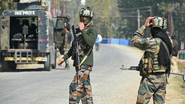 Paramilitary troopers stand guard after a gunfight with militants at Hajin village of Kashmir's Bandipora district, north of Srinagar. (AFP File Photo) Paramilitary troopers stand guard after a gunfight with militants at Hajin village of Kashmir's Bandipora district, north of Srinagar. (AFP File Photo)