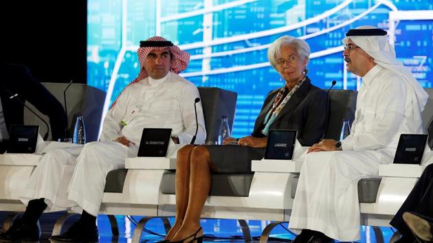 International Monetary Fund (IMF) managing director Christine Lagarde (C) with chief executive and managing director of Saudi Arabia’s public investment fund Yasir al-Rumayyan (L) and president and CEO of Aramco Amin Nasser attends the Future Investment Initiative conference in Riyadh, Saudi Arabia, on Tuesday. (Reuters) International Monetary Fund (IMF) managing director Christine Lagarde (C) with chief executive and managing director of Saudi Arabia’s public investment fund Yasir al-Rumayyan (L) and president and CEO of Aramco Amin Nasser attends the Future Investment Initiative conference in Riyadh, Saudi Arabia, on Tuesday. (Reuters)