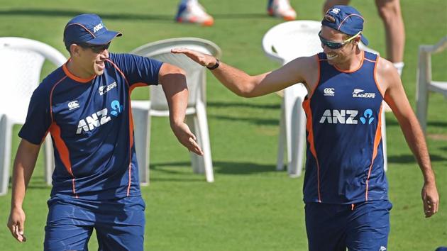 New Zealand players Tim Southee and Ross Taylor share a light moment. (PTI) 