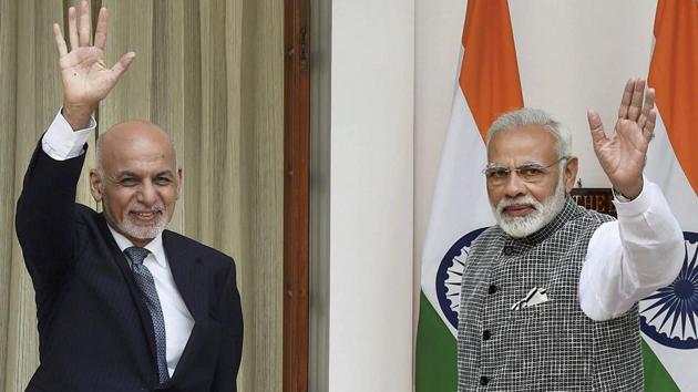 Prime Minister Narendra Modi and Afghanistan President Mohammad Ashraf Ghani wave at the media prior to their luncheon talks in New Delhi on Tuesday. (PTI Photo) Prime Minister Narendra Modi and Afghanistan President Mohammad Ashraf Ghani wave at the media prior to their luncheon talks in New Delhi on Tuesday. (PTI Photo)