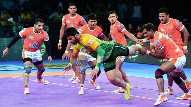 Pardeep Narwal in Green jersey of Patna Pirates is pinned down by Puneri Paltan players during their Pro Kabaddi league match. (PTI) Pardeep Narwal in Green jersey of Patna Pirates is pinned down by Puneri Paltan players during their Pro Kabaddi league match. (PTI)