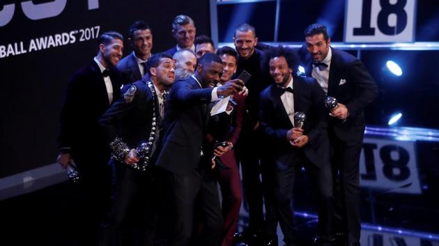 Actor Idris Elba poses for a selfie with FIFA FIFPro World 11 players Neymar, Cristiano Ronaldo, Lionel Messi, Andres Iniesta, Luka Modric, Toni Kroos, Dani Alves, Sergio Ramos, Leonardo Bonucci, Marcelo and Gianluigi Buffon. (REUTERS)