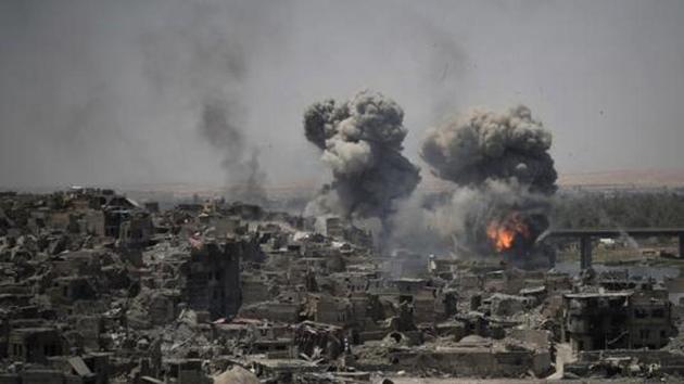 File photo from July 11, 2017 shows airstrikes targeting Islamic State positions on the edge of the Old City a day after Iraq's prime minister declared "total victory" in the city of Mosul.(AP)