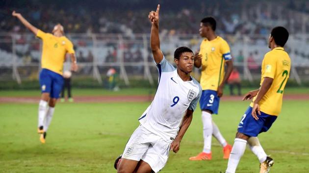 England's Rhian Brewster celebrates after scoring a goal against Brazil. (PTI) England's Rhian Brewster celebrates after scoring a goal against Brazil. (PTI)