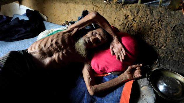 An elderly Rohingya refugee man lies at his shelter in Kutupalong refugee camp in Cox's Bazar on October 20, 2017. (Zohra Bensemra / REUTERS)