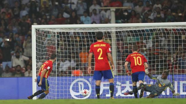 Spain's Abel Ruiz scores a penalty to give Spain the lead. (REUTERS)