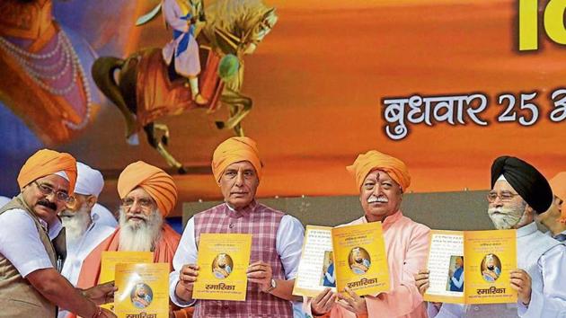 Union home minister Rajnath Singh (centre) and RSS chief Mohan Bhagwat (2nd from right) with other leaders releasing a souvenir at a function organised to mark the 350th birth anniversary of Guru Gobind Singh in New Delhi on Wednesday. (PTI) Union home minister Rajnath Singh (centre) and RSS chief Mohan Bhagwat (2nd from right) with other leaders releasing a souvenir at a function organised to mark the 350th birth anniversary of Guru Gobind Singh in New Delhi on Wednesday. (PTI)
