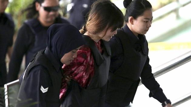 Vietnamese Doan Thi Huong, center, is escorted by police as she arrives for court hearing at Shah Alam court house in Shah Alam, outside Kuala Lumpur, Malaysia Thursday, Oct. 26, 2017. (AP) Vietnamese Doan Thi Huong, center, is escorted by police as she arrives for court hearing at Shah Alam court house in Shah Alam, outside Kuala Lumpur, Malaysia Thursday, Oct. 26, 2017. (AP)