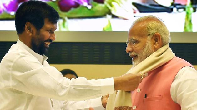 Prime Minister Narendra Modi being presented a shawl by Union minister for Consumer Affairs Ram Vilas Paswan at the International Conference on Consumer Protection for East, South & South-East Countries, in New Delhi on Thursday. (PTI) Prime Minister Narendra Modi being presented a shawl by Union minister for Consumer Affairs Ram Vilas Paswan at the International Conference on Consumer Protection for East, South & South-East Countries, in New Delhi on Thursday. (PTI)