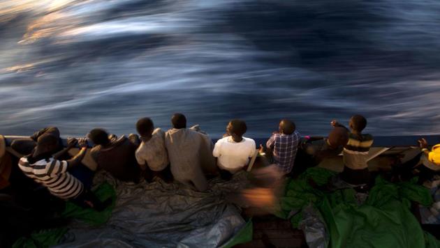 Migrants and refugees on the deck of a vessel on the Mediterranean Sea. (AP file photo) Migrants and refugees on the deck of a vessel on the Mediterranean Sea. (AP file photo)