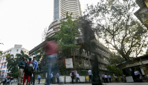 People near Bombay Stock Exchange (BSE) as Sensex crosses 33,000 mark, in Mumbai on Tuesday. (Kunal patil/HT FILE PHOTO) People near Bombay Stock Exchange (BSE) as Sensex crosses 33,000 mark, in Mumbai on Tuesday. (Kunal patil/HT FILE PHOTO)