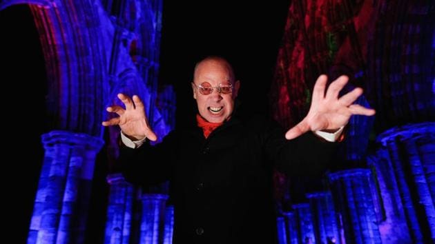 Richard Hollick plays Dracula during a spectacular light display illuminating the ruins of the historic Whitby Abbey.  (Ian Forsyth / Getty Images) 