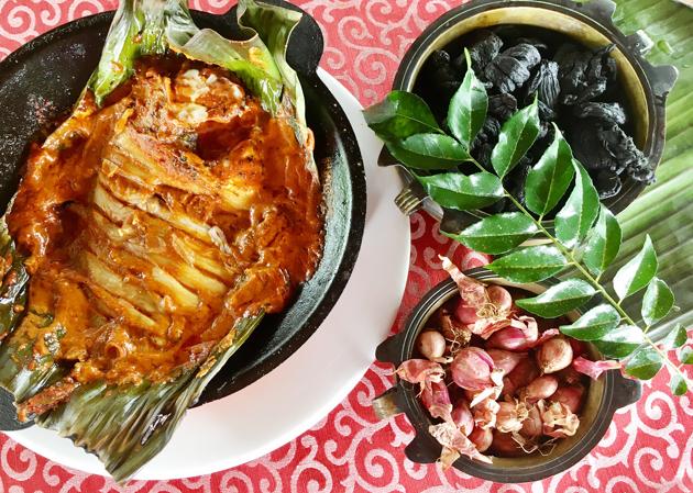 Karimeen Pollichathu (Pearl Spot fish cooked in Banana Leaf) is one a traditional delicacy of Kerala