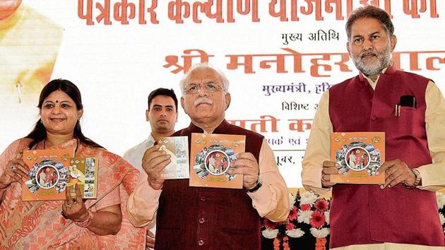 Chief minister Manohar Lal Khattar with education minister Ram Bilas Sharma and women and child development minister Kavita Jain launching welfare schemes for journalists in Panchkula on Thursday. (Keshav Singh) Chief minister Manohar Lal Khattar with education minister Ram Bilas Sharma and women and child development minister Kavita Jain launching welfare schemes for journalists in Panchkula on Thursday. (Keshav Singh)