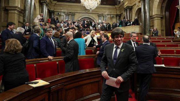 Catalan President Carles Puigdemont smiles after the Catalan regional Parliament declared independence from Spain in Barcelona, October 27, 2017. (REUTERS)