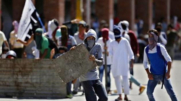 A protest by Kashmiri youth in Srinagar in August. (AP) A protest by Kashmiri youth in Srinagar in August. (AP)
