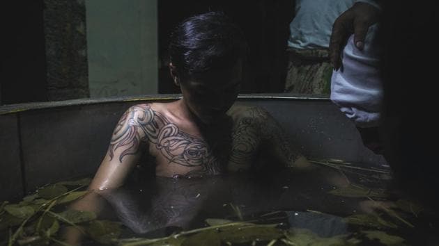 Bayu, a recovering drug addict sits in a hot water herbal bath as part of the treatment by the head of rehabilitation centre, Ustad Ahmad Ischsan Maulana in Purbalingga, Indonesia. (Ulet Ifansasti / Getty Images) Bayu, a recovering drug addict sits in a hot water herbal bath as part of the treatment by the head of rehabilitation centre, Ustad Ahmad Ischsan Maulana in Purbalingga, Indonesia. (Ulet Ifansasti / Getty Images)