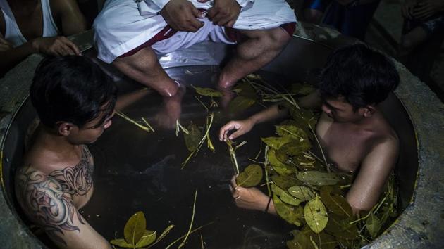 Recovering drug addicts sit in a boiling herbal bath. The traditional rehabilitation center in Purbalingga village has treated hundreds of addicts with herbal teas, baths, prayer and counselling. (Ulet Ifansasti / Getty Images) Recovering drug addicts sit in a boiling herbal bath. The traditional rehabilitation center in Purbalingga village has treated hundreds of addicts with herbal teas, baths, prayer and counselling. (Ulet Ifansasti / Getty Images)