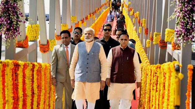 Prime Minister Narendra Modi with Gujarat chief minister Vijay Rupani at Ghogha Sea Ferry point to mark the inauguration of Ghogha-Dahej Ro-Ro ferry service, in Ghogha, Bhavnagar, on October 22, 2017.(PTI Photo)