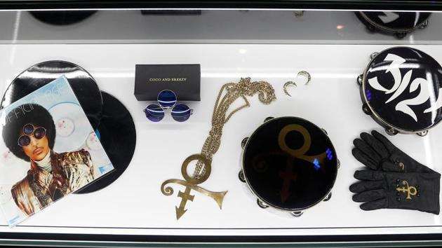 A glass case holds items owned by Prince at the ‘My Name Is Prince’ exhibition in London, Britain. London was one of Prince’s favourite destinations and it was here at the O2 Arena that Prince performed 21 consecutive sell-out shows in 2007. (REUTERS / Peter Nicholls)