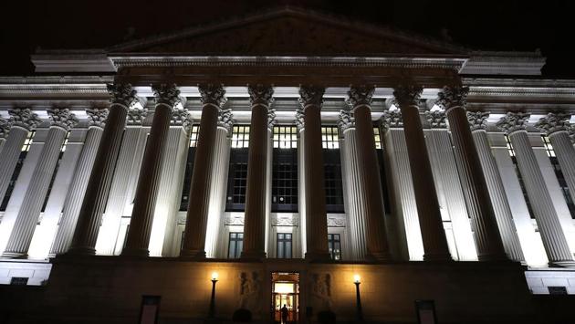 A man enters the United States National Archives building on October 26, 2017 in Washington, DC. The US government on Thursday released a mammoth, long-awaited trove of secret files on the assassination of president Kennedy, but withheld others for further review on national security grounds. (Mark Wilson / Getty Images / AFP) A man enters the United States National Archives building on October 26, 2017 in Washington, DC. The US government on Thursday released a mammoth, long-awaited trove of secret files on the assassination of president Kennedy, but withheld others for further review on national security grounds. (Mark Wilson / Getty Images / AFP)