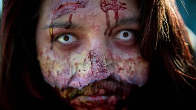 Chilean students take part in a parade for the upcoming Halloween celebration, in Santiago, on October 25, 2017. (Martin Bernetti / AFP)