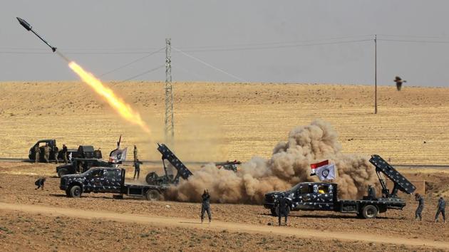 A picture taken on October 26, 2017 shows rockets being launched from Iraqi security forces' against Kurdish Peshmerga positions in the area of Faysh Khabur, which is located on the Turkish and Syrian borders in the Iraqi Kurdish autonomous region. (Ahmad Al- Rubaye / AFP)