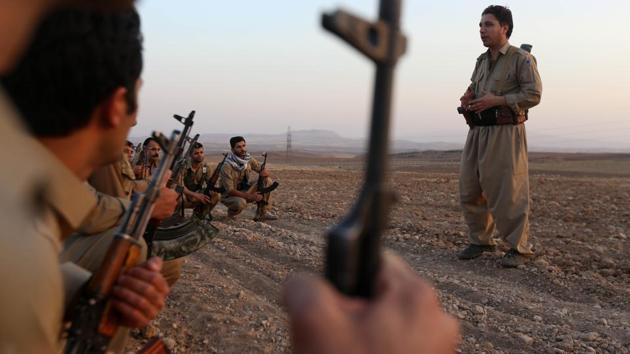 Iranian Kurdish Peshmerga, members of the Iranian Kurdistan Democratic Party (KDP-Iran), take part in routine military exercise in Koya, 100 kms east of Arbil, the capital of the autonomous Kurdish region of northern Iraq. (Safin Hamed / AFP)