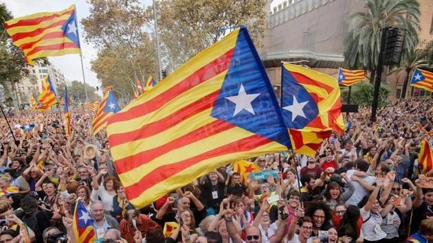 A motion declaring independence was approved with 70 votes in favour, 10 against and two abstentions, with Catalan opposition MPs walking out of the 135-seat chamber before the vote in protest at a declaration unlikely to be given official recognition. (AFP Photo)