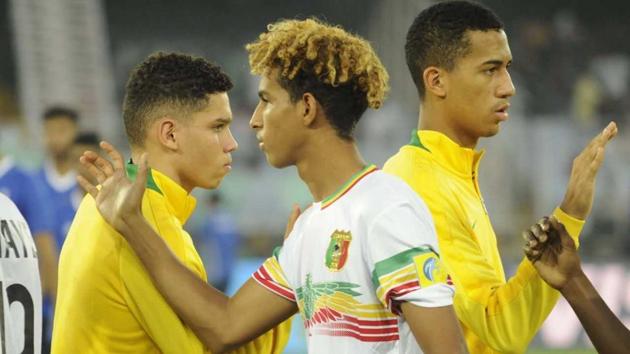 Brazil U 17 player Paulinho and Salam Giddou of Mali before the match. (Samir Jana/HT Photo)