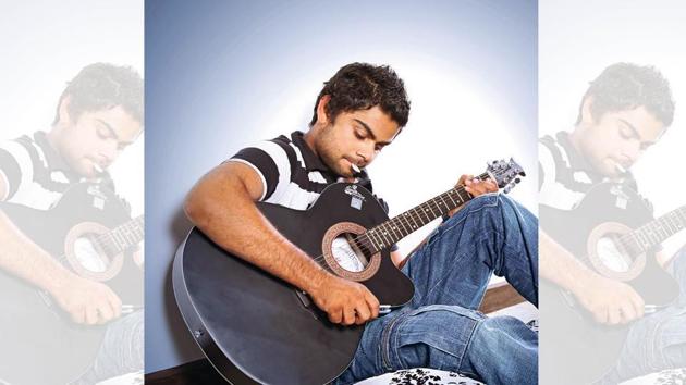 A young Virat trying his hand at the guitar. (Chandan Ahuja)