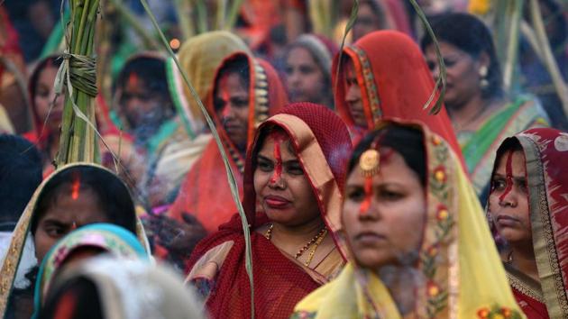 Women during Chhat Puja celebrations at Karvenagar in Pune on Thursday. (Pratham Gokhale/HT Photo)