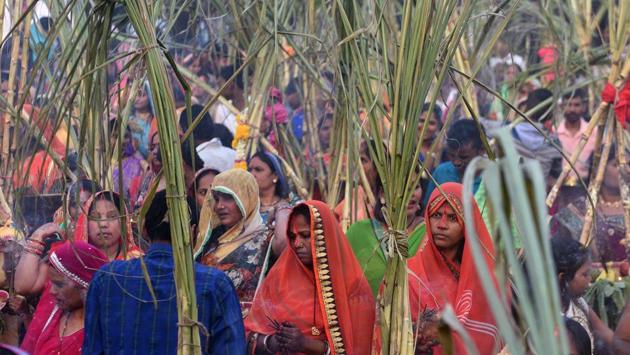 Women during Chhat Puja celebrations at Karvenagar in Pune on Thursday. (Pratham Gokhale/HT Photo)