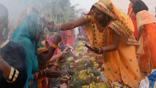 Women during Chhat Puja celebrations at Karvenagar in Pune on Thursday. (Pratham Gokhale/HT Photo)