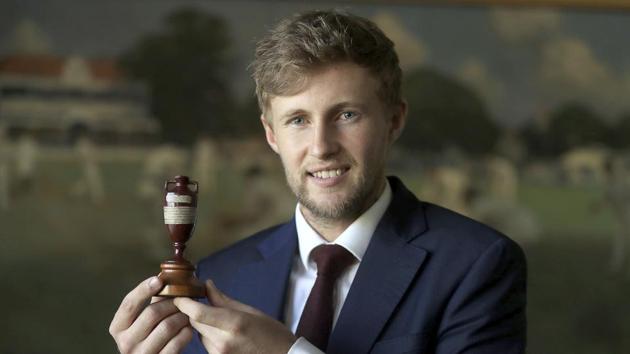 England's current team captain Joe Root holds the trophy as he faces the media at Lord's in London, Friday Oct. 27, 2017. The England cricket team depart for Australia on Saturday in preparation for the start of the upcoming Ashes Series.(AP)