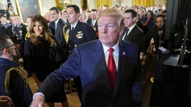 President Donald Trump at the White House in Washington. Trump allegedly did not make it easy for spy agencies which were looking to redact much of the information released on Thursday. (AP Photo) President Donald Trump at the White House in Washington. Trump allegedly did not make it easy for spy agencies which were looking to redact much of the information released on Thursday. (AP Photo)