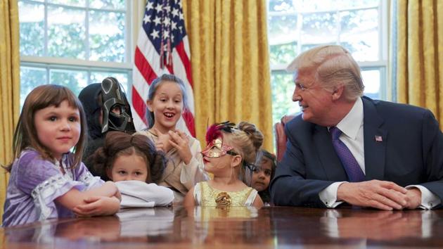 The president also dispensed plenty of compliments, congratulating the kids’ parents for doing a good job . (AP Photo)