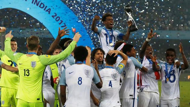 England players celebrate after lifting the FIFA U-17 World Cup trophy for the first time. They beat Spain in the final 5-2 in Kolkata on Saturday. (Reuters)