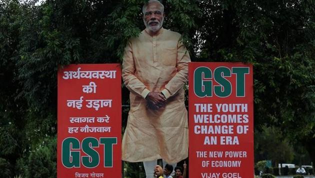 A hoarding in favour of the implementation of the Goods and Services Tax (GST) at a street in New Delhi. (Reuters File)