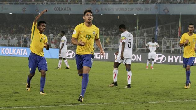 Brazil's Yuri Alberto, center, celebrates after scoring the second goal for his team. (AP)