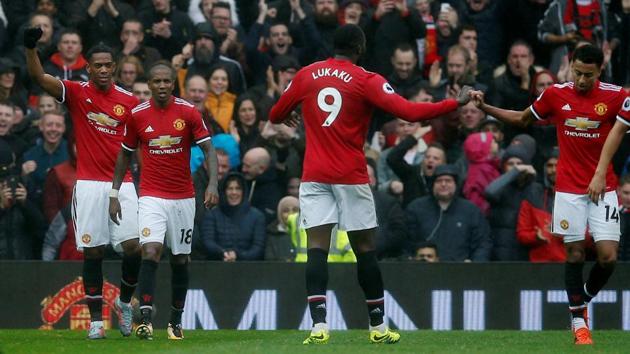 Manchester United's Anthony Martial celebrates scoring their first goal with teammates against Tottenham Hotspur at Old Trafford on Saturday. (Reuters) Manchester United's Anthony Martial celebrates scoring their first goal with teammates against Tottenham Hotspur at Old Trafford on Saturday. (Reuters)