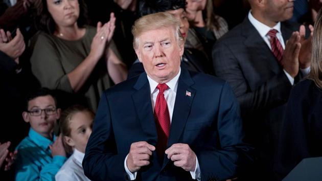 US President Donald Trump arrives to deliver remarks in the East Room of the White House in Washington, DC on October 26, 2017. (AFP) US President Donald Trump arrives to deliver remarks in the East Room of the White House in Washington, DC on October 26, 2017. (AFP)