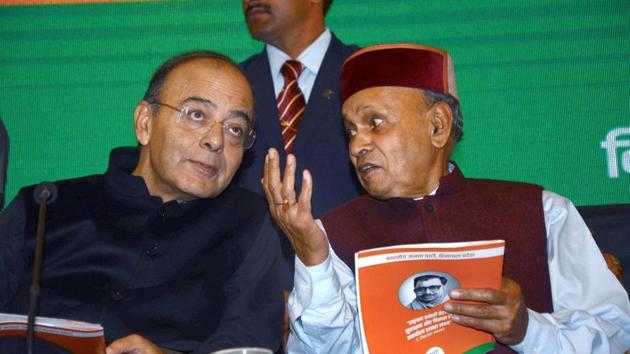 Union finance minister Arun Jaitley with former chief minister Prem Kumar Dhumal during launch of BJP Golden Vision document for the Assembly elections, in Shimla on Sunday. (PTI Photo) Union finance minister Arun Jaitley with former chief minister Prem Kumar Dhumal during launch of BJP Golden Vision document for the Assembly elections, in Shimla on Sunday. (PTI Photo)