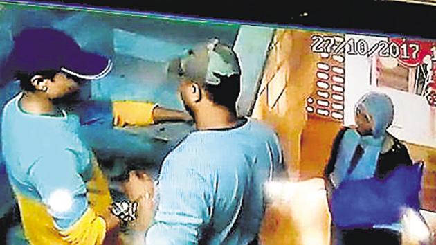 A CCTV grab shows three of the six robbers.(Hindustan Times)