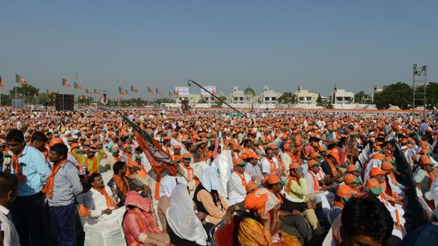 Supporters assemble at a gathering of Bhartiya Janata Party during Gujarat Gaurav Mahasamellan at Bhaat village on the outskirts of Ahmedabad on October 16. (AFP file) Supporters assemble at a gathering of Bhartiya Janata Party during Gujarat Gaurav Mahasamellan at Bhaat village on the outskirts of Ahmedabad on October 16. (AFP file)