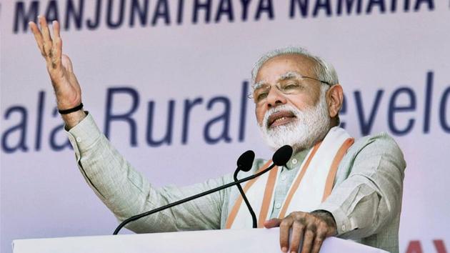 Prime Minister Narendra Modi addresses a public meeting for the launch of various programme at Ujire, in Karnataka on Sunday. (PTI) Prime Minister Narendra Modi addresses a public meeting for the launch of various programme at Ujire, in Karnataka on Sunday. (PTI)