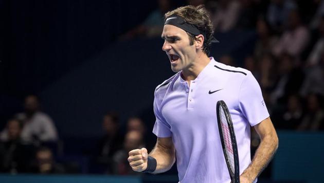 Switzerland's Roger Federer reacts during his match against Juan Martin Del Potro at the Swiss Indoors tournament.(AFP)