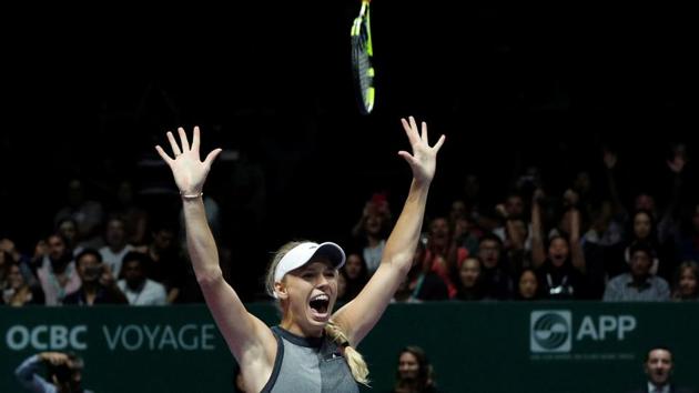 Caroline Wozniacki celebrates after winning the WTA Finals final against Venus Williams.(REUTERS)