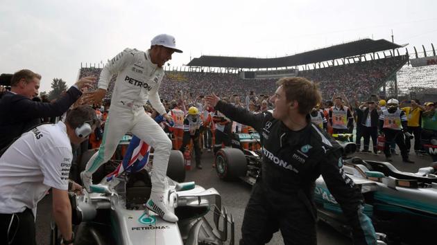Hamilton joined Alain Prost and Sebastian Vettel as the other drivers to have won the F1 world title four times. (AFP)
