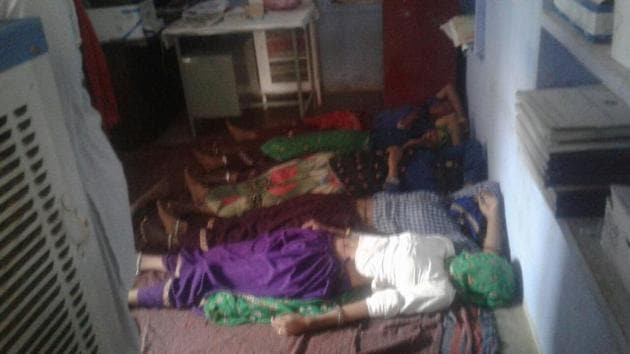 The women were laid down on blankets spread on the floor in the PHC’s corridor. (HT PHOTO) The women were laid down on blankets spread on the floor in the PHC’s corridor. (HT PHOTO)